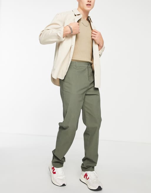 ASOS DESIGN – Zielone chinosy o luźnym kroju z efektem sprania