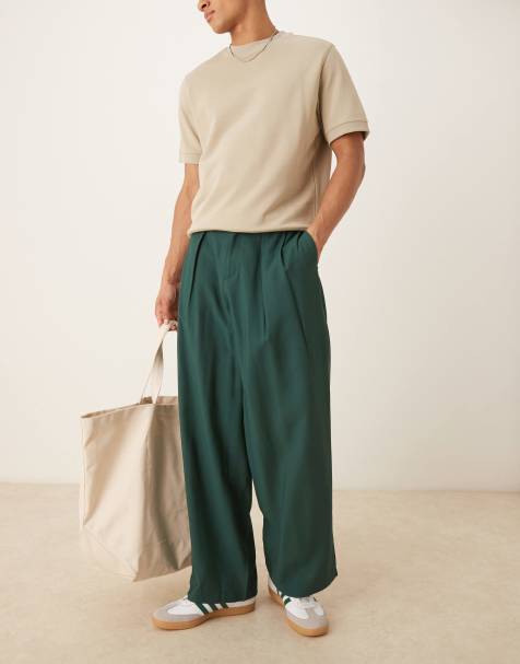 ASOS DESIGN – Zielone eleganckie spodnie o fasonie podkowy z zakładkami i paskiem - view 1