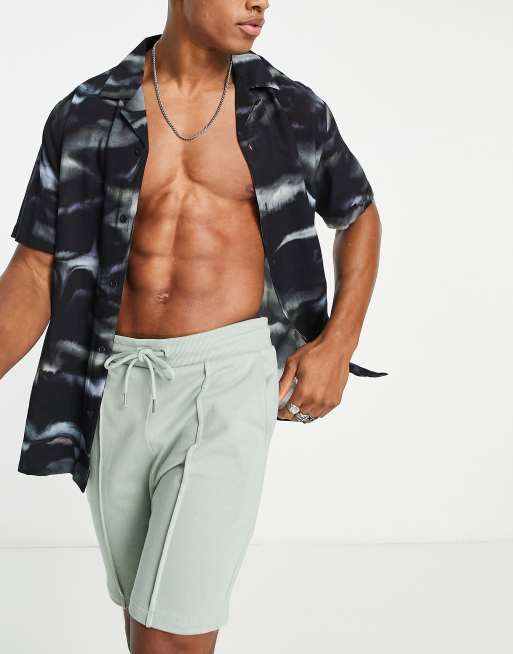 ASOS DESIGN – Zielone szorty z dżerseju o obcisłym kroju z zakładkami