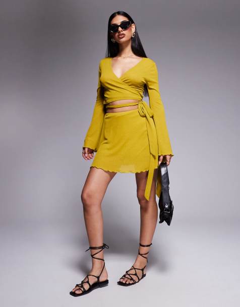 ASOS DESIGN – Zielonożółta kopertowa spódnica mini z siateczki z falbaną i węzłem z boku, część zestawu - view 1