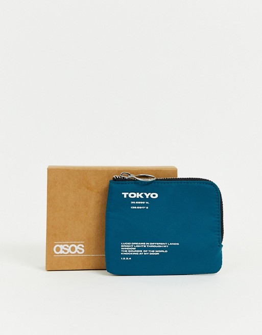 ASOS DESIGN zip around wallet with white text detail in blue