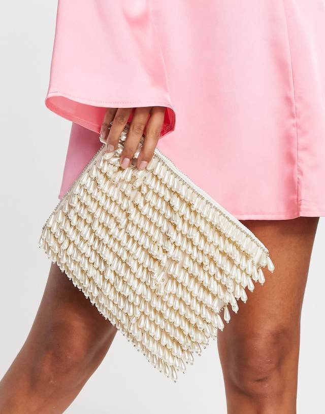 ASOS DESIGN zip top clutch in all over pearl in cream