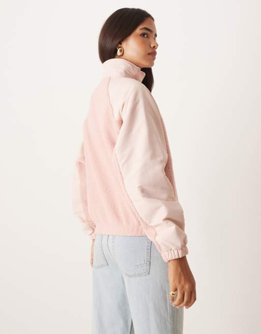 ASOS DESIGN zip through fleece with nylon detail in tonal pink