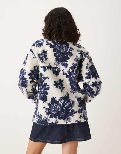 ASOS DESIGN zip up teddy fleece in navy and cream floral design