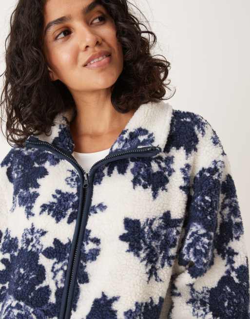 ASOS DESIGN zip up teddy fleece in navy and cream floral design