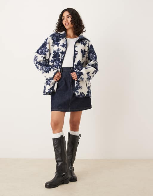 ASOS DESIGN zip up teddy fleece in navy and cream floral design