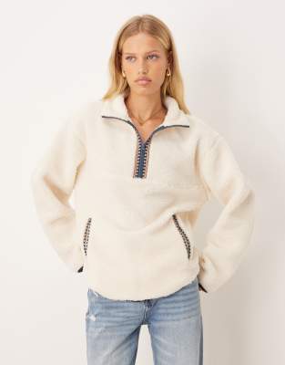 Asos Design Zip Up Teddy Fleece Sweatshirt With Folk Trim Detailing In Neutral