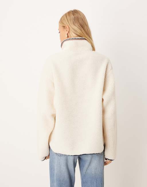 ASOS DESIGN zip up teddy fleece sweatshirt with folk trim detailing in cream, 3 of 4