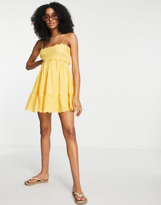 ASOS DESIGN – Żółta letnia sukienka mini z wycięciem na plecach i  muszelkowym wykończeniem | ASOS