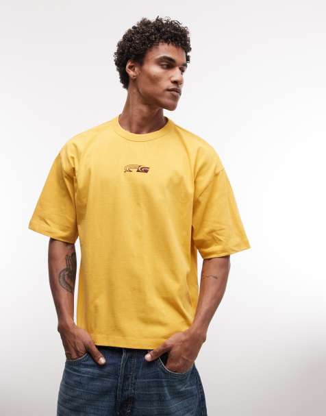 ASOS DESIGN – Żółty pudełkowy T-shirt oversize z grafiką w miejskim stylu - view 1