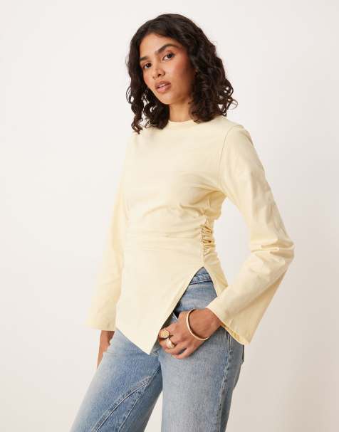ASOS DESIGN asymmetric hem long sleeve ruched side top in yellow