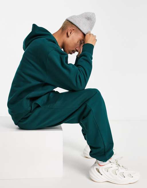ASOS DESIGN - Zware oversized joggingbroek in bosgroen