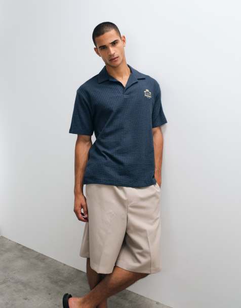 ASOS DESIGN zware relaxed polo met borduursel op de borst in marineblauwe seersuckerstreep - view 1
