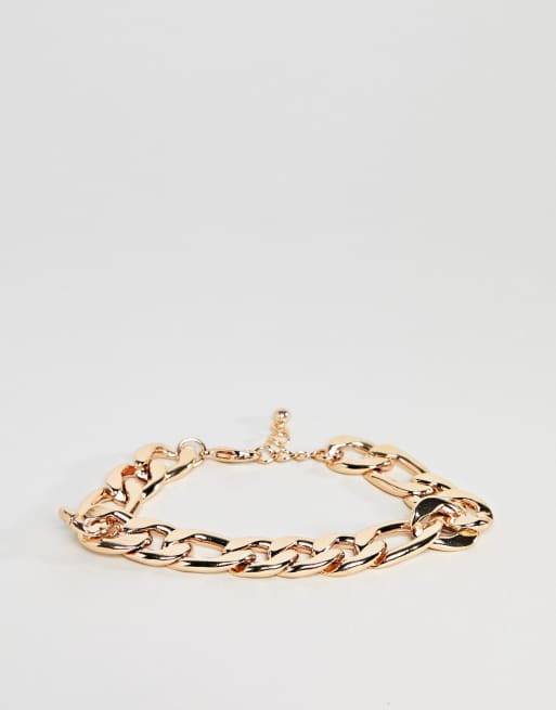 ASOS DESIGN - Zware schakelarmband in goudkleur