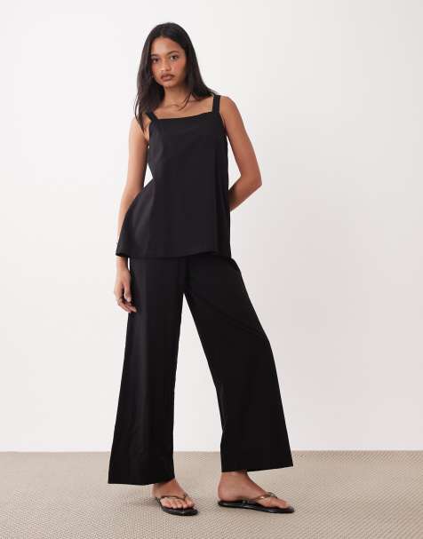 ASOS DESIGN – Zweilagiger Camisole-Jumpsuit in Schwarz - view 1