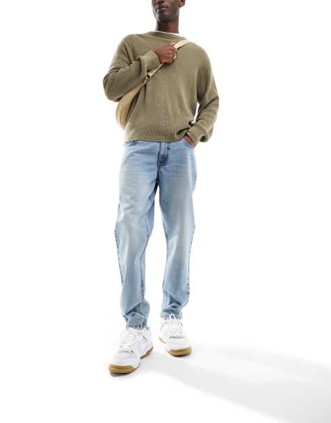 ASOS DESIGN – Zwężane jasnoniebieskie jeansy z przebarwieniami - view 1