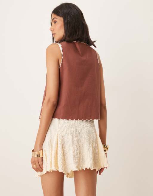 ASOS DESIGN - Zwierige mini rok met textuur en godet-plooien in ivoorwit, 3 van 5