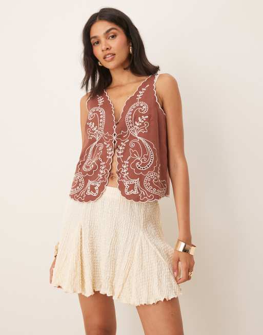 ASOS DESIGN - Zwierige mini rok met textuur en godet-plooien in ivoorwit, 4 van 5