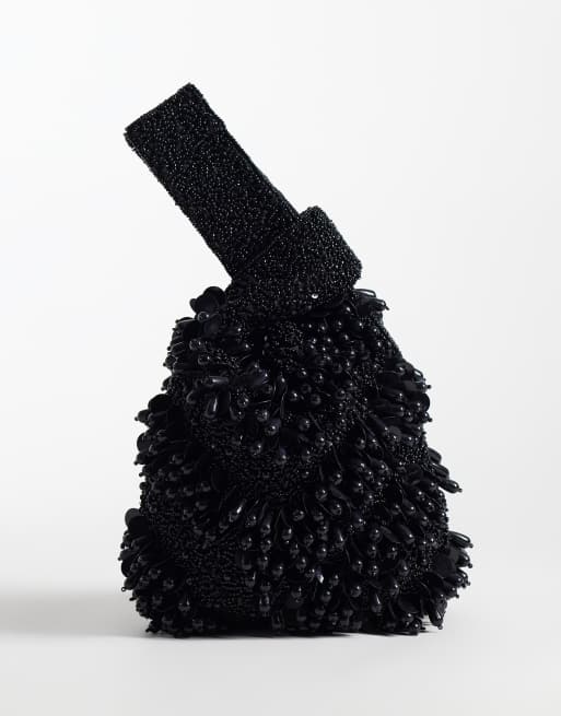 ASOS DESING - bolso de mano tipo clutch negro con adorno de aro, 1 de 4