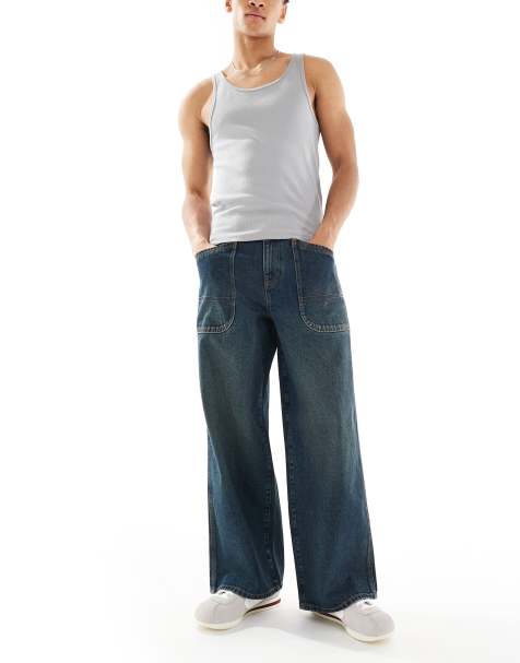 ASOS DESISN super baggy jeans with green tint in dark wash blue - view 1
