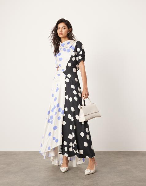 ASOS EDITION – Blockfärgad, prickig midiklänning med draperad ringning och asymmetrisk fåll - view 1