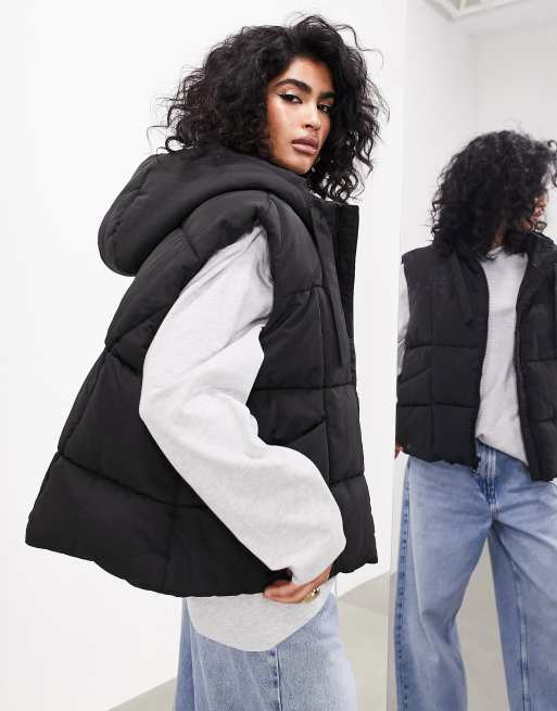 Black puffer vest with sales hood