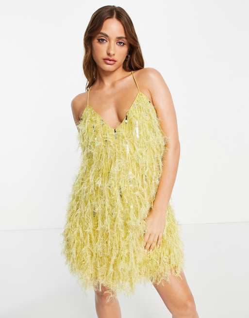 ASOS EDITION – Citrongul miniklänning med med fuskfjädrar och paljetter och lågt skuren rygg
