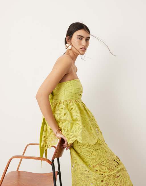 ASOS Edition - Cornelli - Top a fascia allacciato sulla schiena con motivo floreale verde lime in coordinato
