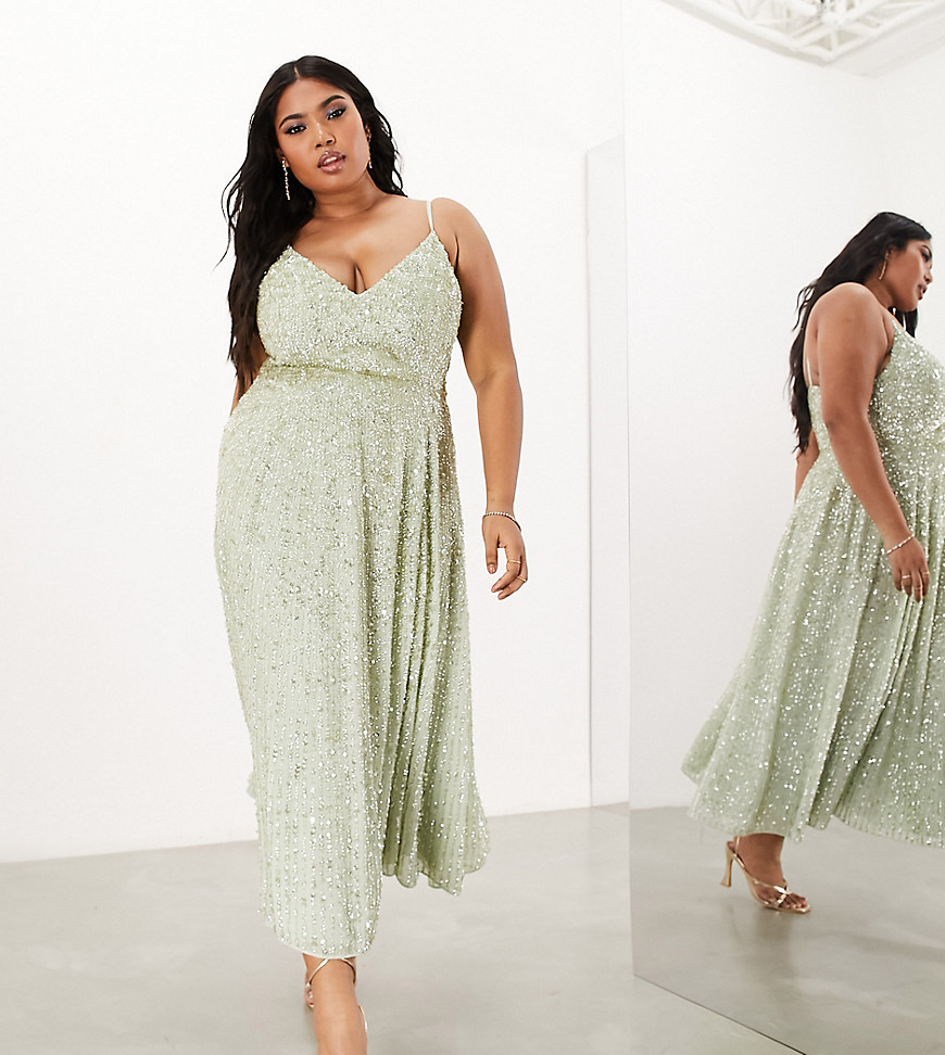 Plus-size dress by ASOS EDITION Am I... the drama? Plunge neck Cami straps Zip-back fastening Regular fit Make-up products worn by model: Bobbi Brown Skin Foundation in shade 4.75 Golden Natural Bobbi Brown Skin Cover Concealer in shade Golden