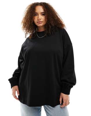 ASOS EDITION Curve - Lang geschnittenes, hochwertiges Oberteil aus strukturiertem Jersey in Schwarz