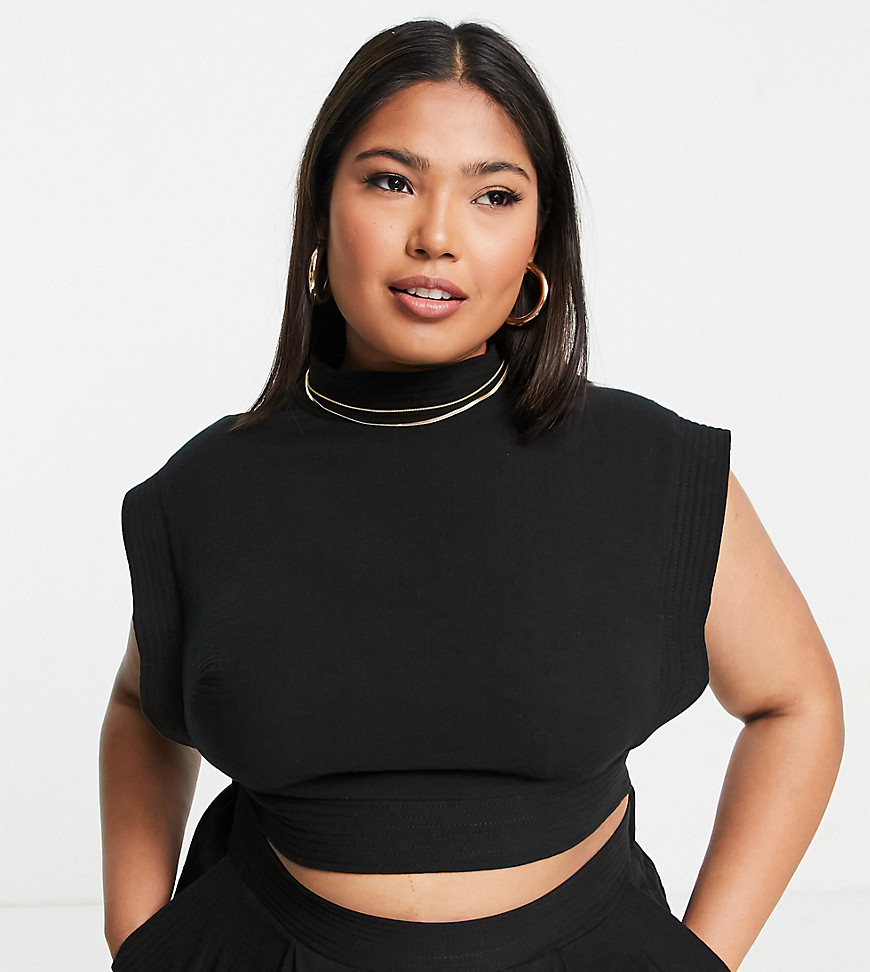 Plus-size top by ASOS EDITION Part of a co-ord set Trousers sold separately High neck Sleeveless style Zip-back fastening Regular fit