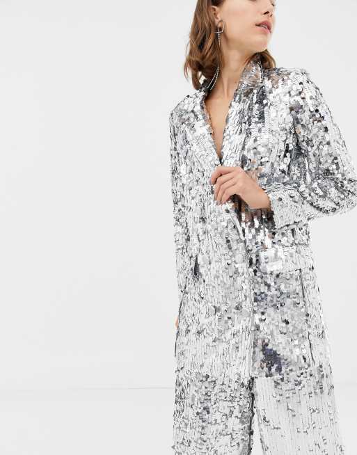 ASOS DESIGN Tall Oversized Sequin Puffer Jacket In Silver, $21, Asos