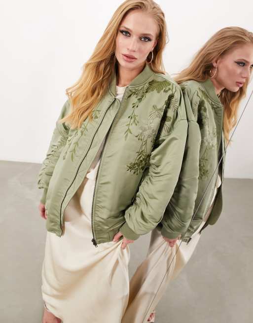 ASOS DESIGN oversized varsity cotton bomber jacket in green with embroidery  badging