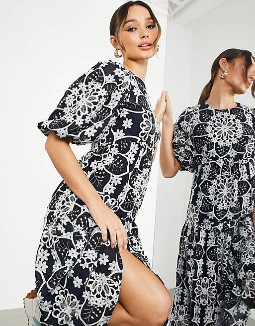  geo floral embroidered midi dress with tiered hem in navy 