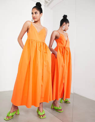 ASOS EDITION - Gesmoktes Midi-Sommerkleid in leuchtendem Orange mit Wickeldetail und schmalen Trägern