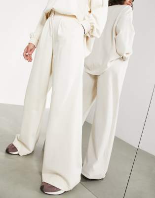 ASOS EDITION high-waisted pants in textured jersey in cream