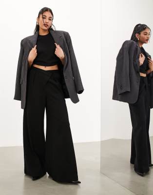 ASOS EDITION - Hose aus erstklassigem, strukturiertem Jersey in Schwarz mit weitem Bein und asymmetrischem Bund