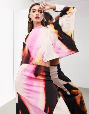 long sleeve draped placement top in pink abstract-Multi