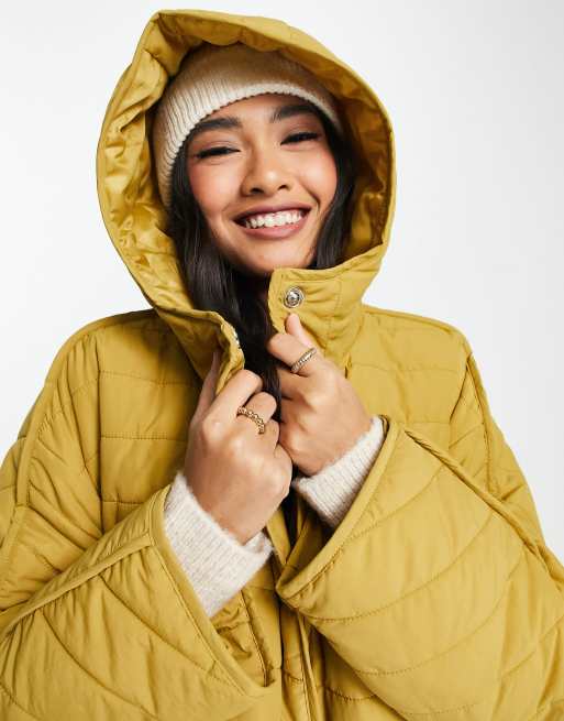 ASOS EDITION longline quilted jacket with hood in ochre