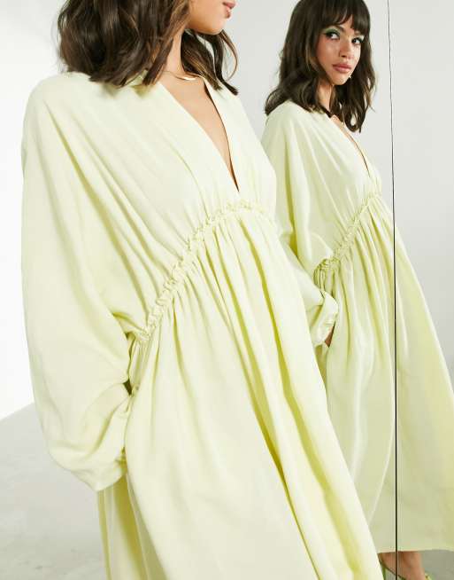 ASOS EDITION - Midi-jurk met aangerimpelde taille en vleermuismouwen in limoengroen met wassing