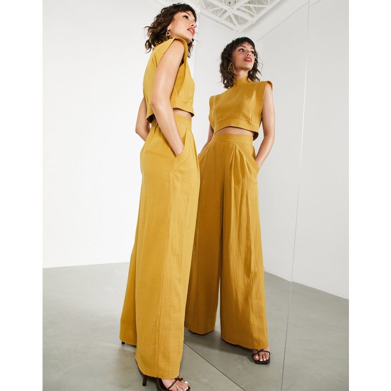 Designer  EDITION - Pantaloni a fondo ampio giallo senape con cuciture