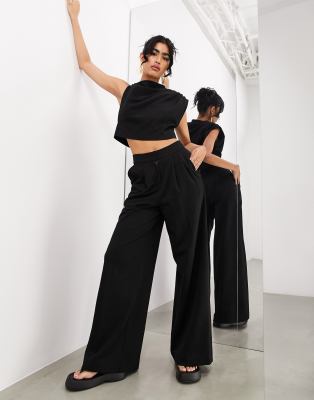 premium textured jersey pleat front wide leg pants in black