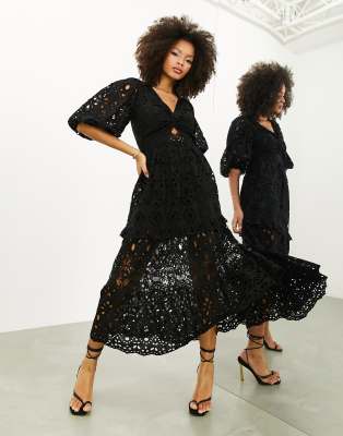 ASOS EDITION - Robe mi-longue torsadée sur le devant en broderie anglaise à manches bouffantes - Noir | ASOS