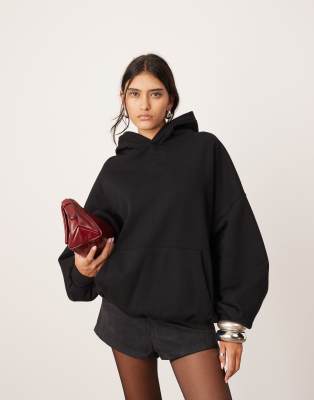 ASOS EDITION - Schwerer, hochwertiger Oversize-Kapuzenpullover in Schwarz