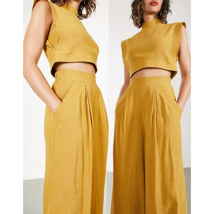 ASOS EDITION sleeveless top with stitch detail in mustard