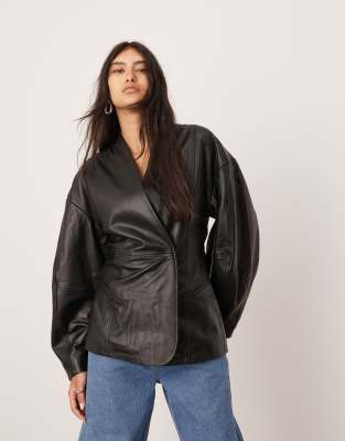 soft leather jacket with ovoid sleeve and cinched waist in black