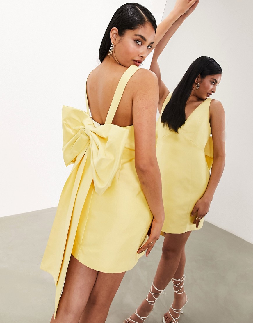 Asos Design Structured Mini Dress With Statement Bow Back Detail In Yellow-pink