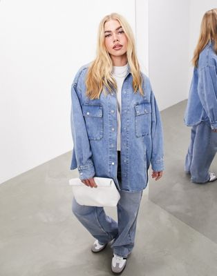 ASOS EDITION denim super oversized shacket with pockets in mid blue - ASOS Price Checker
