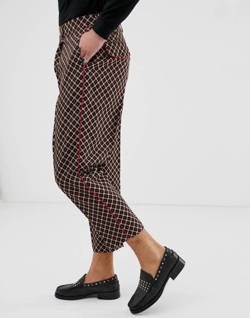 ASOS EDITION – svarta geometriskt mönstrade byxor med avsmalnande ben och låg gren