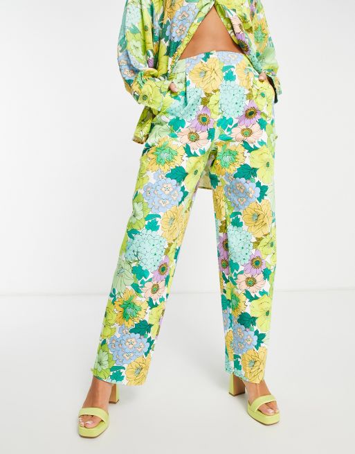ASOS EDITION - Toelopende broek van katoen met retro bloemenprint